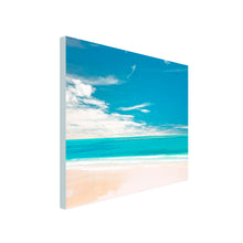 Load image into Gallery viewer, Square Canvas Art of white sand beach with clear turquoise sea and blue sky with intermittent clouds
