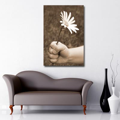 Portrait Art Canvas of childs hand holding white daisy with vintage filter